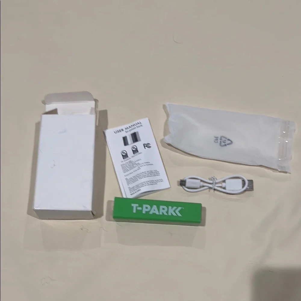 Green and White Charger with Portable Battery Pack for Cell Phones